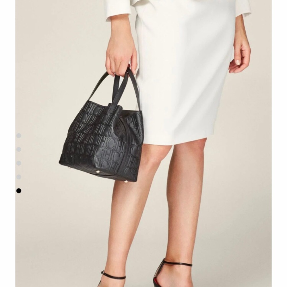 Authentic Carolina Herrera Matryoshka calf hair bag. Pristine condition.